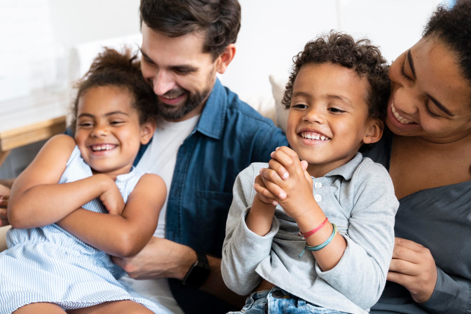 Family embracing outdoors