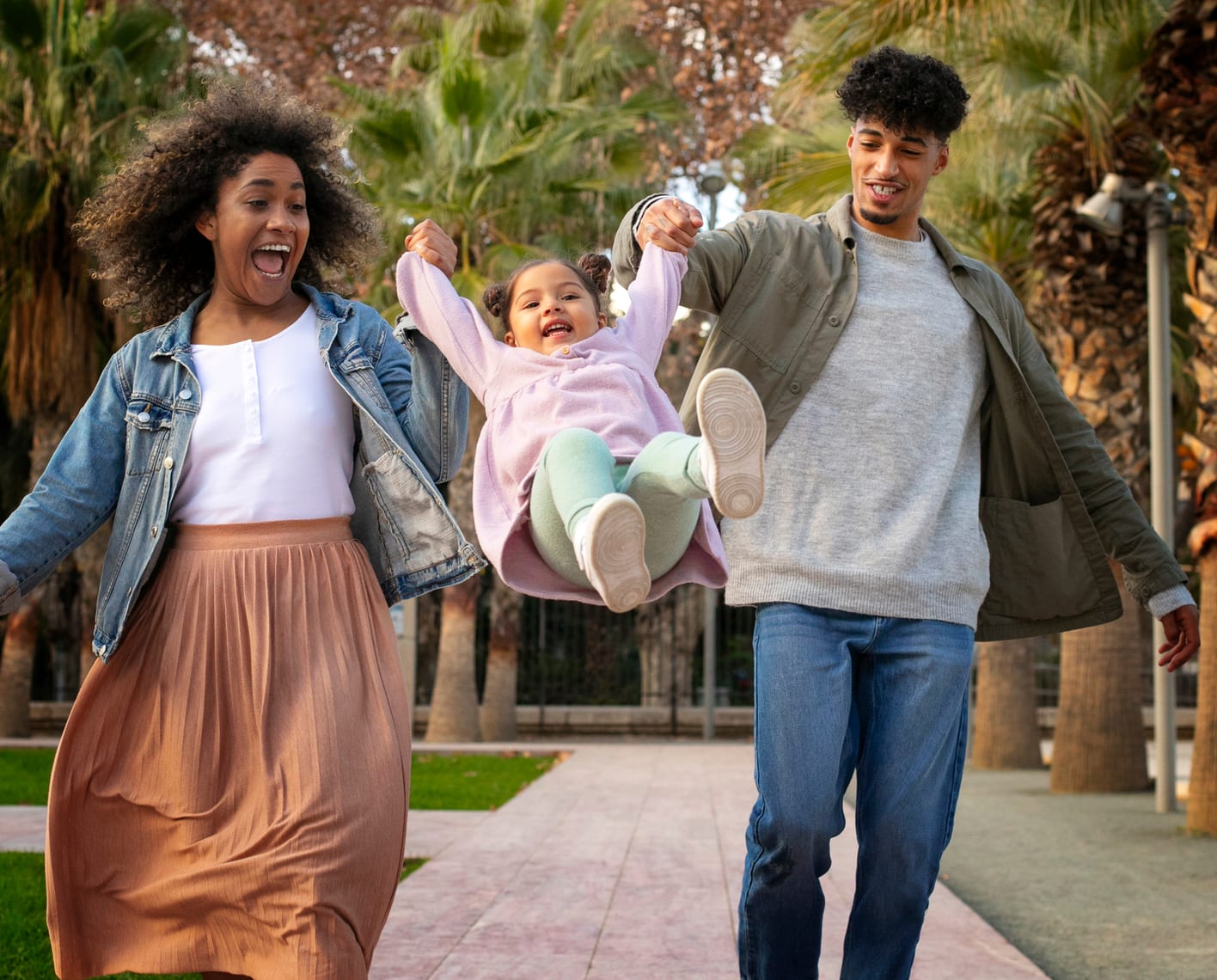 A family playing together outdoors